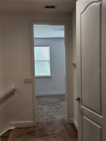 9817 WINNINGTON STREET, Orlando, FL 32832