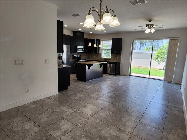 9817 WINNINGTON STREET, Orlando, FL 32832