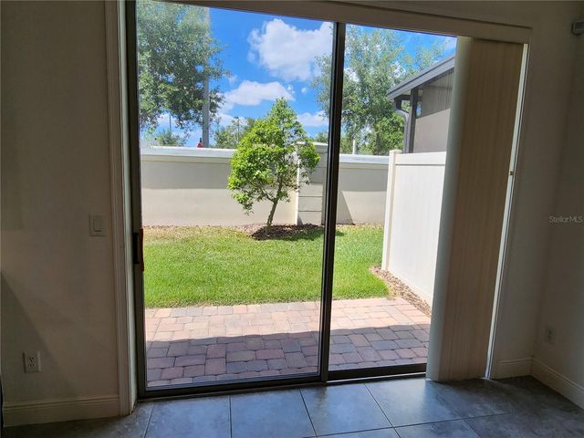 9817 WINNINGTON STREET, Orlando, FL 32832