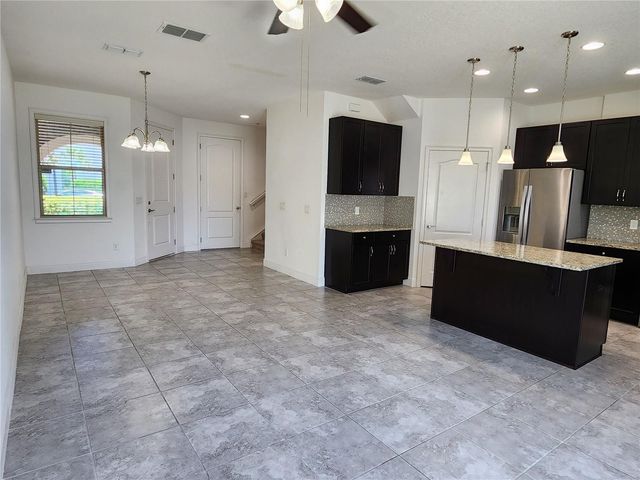 9817 WINNINGTON STREET, Orlando, FL 32832