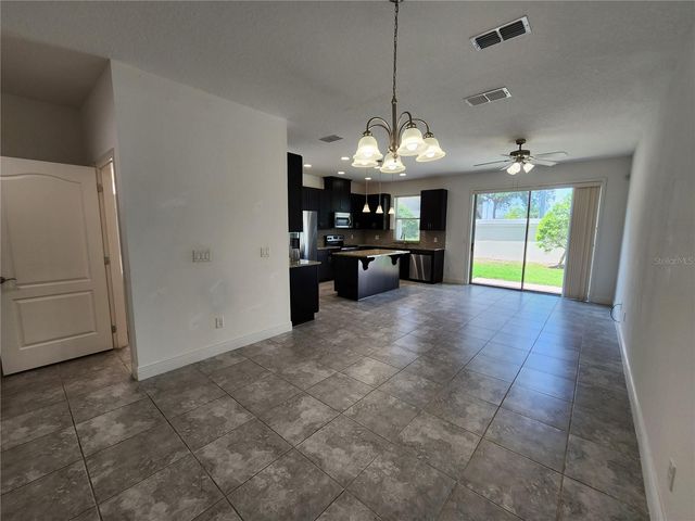 9817 WINNINGTON STREET, Orlando, FL 32832