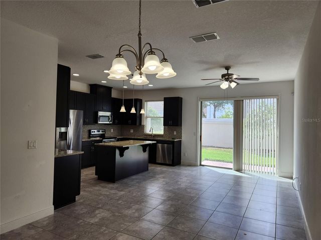 9817 WINNINGTON STREET, Orlando, FL 32832