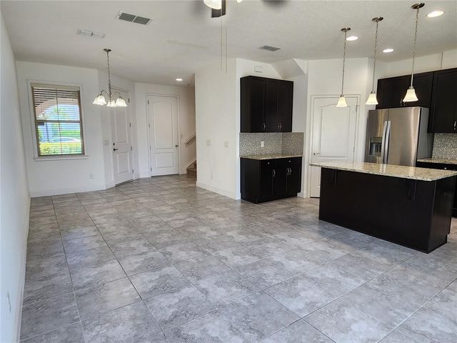 9817 WINNINGTON STREET, Orlando, FL 32832