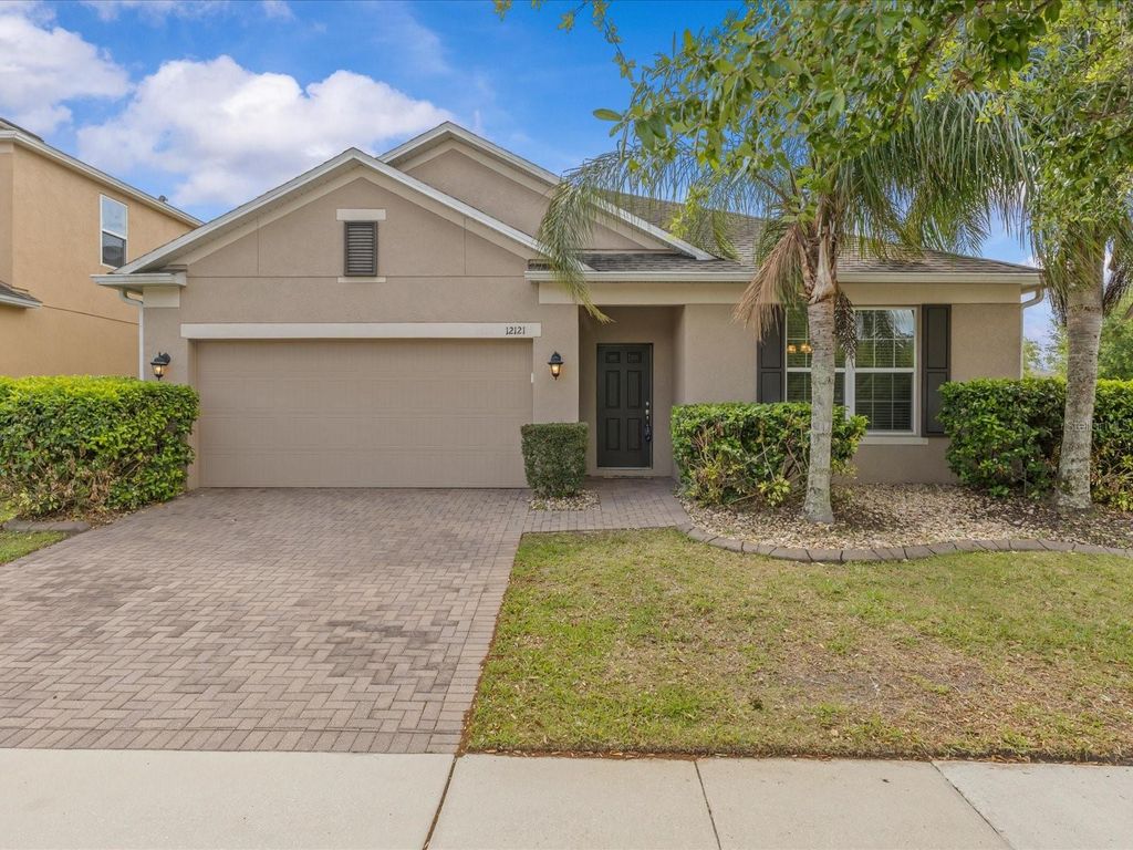 Image 1 of property listing at 12121 HOMESTEAD PARK LANE, Orlando, FL 32824