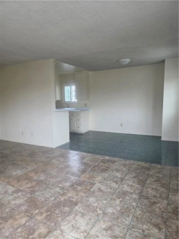 1458 West 101st St., Los Angeles, CA 90047
