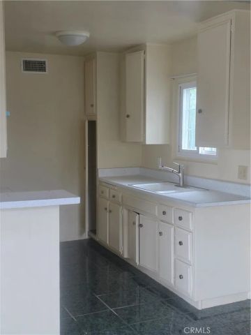 1458 West 101st St., Los Angeles, CA 90047