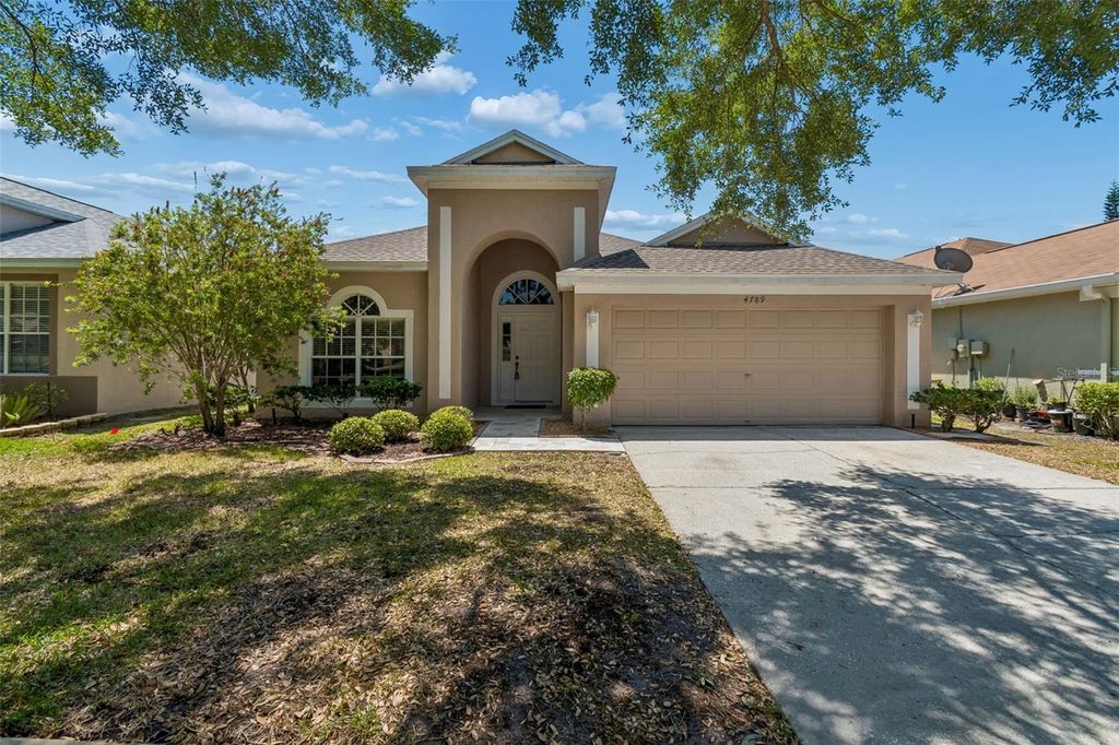 Image 2 of property listing at 4789 WHISPERING WIND AVENUE, Tampa, FL 33614