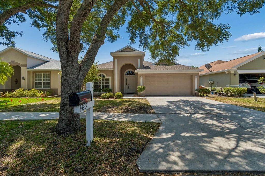 Image 5 of property listing at 4789 WHISPERING WIND AVENUE, Tampa, FL 33614