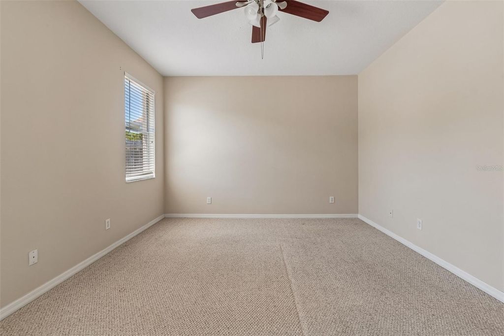 Image 63 of property listing at 4789 WHISPERING WIND AVENUE, Tampa, FL 33614
