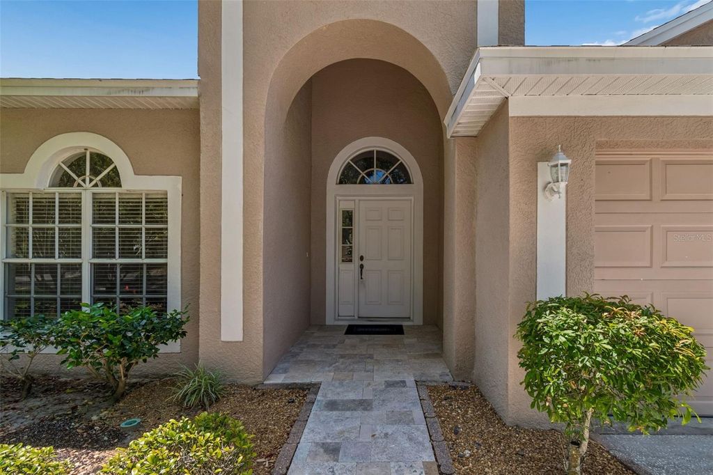 Image 8 of property listing at 4789 WHISPERING WIND AVENUE, Tampa, FL 33614