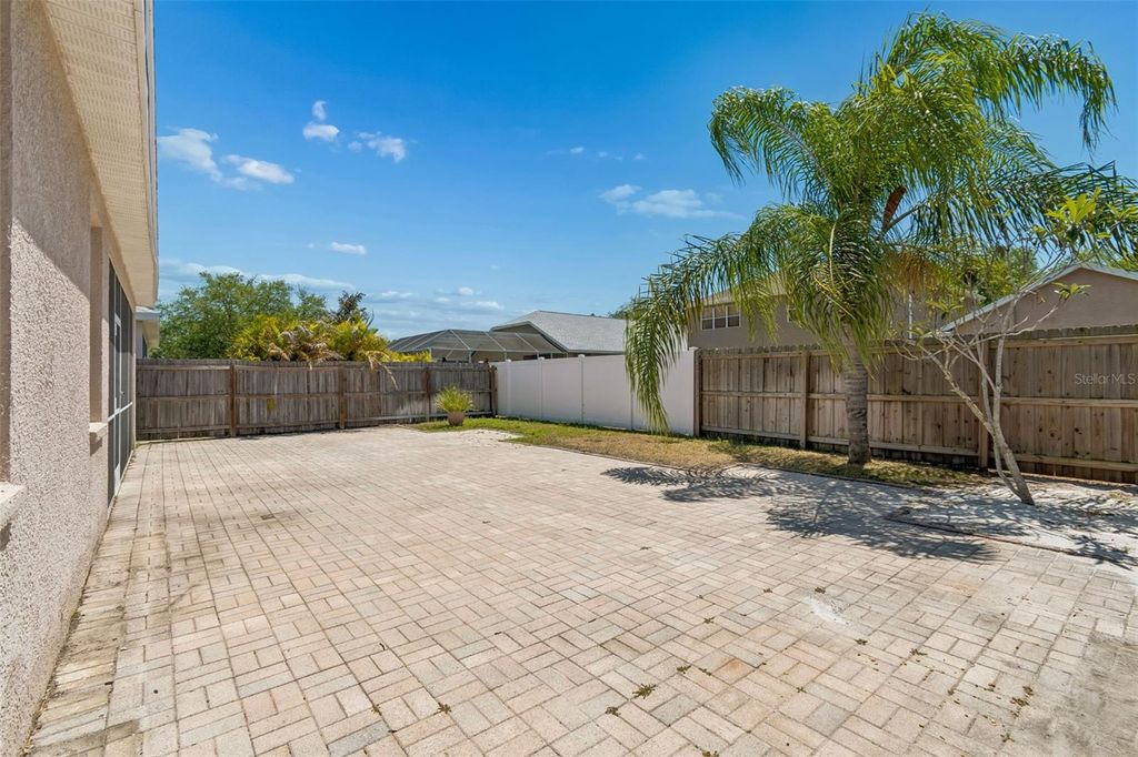 Image 84 of property listing at 4789 WHISPERING WIND AVENUE, Tampa, FL 33614