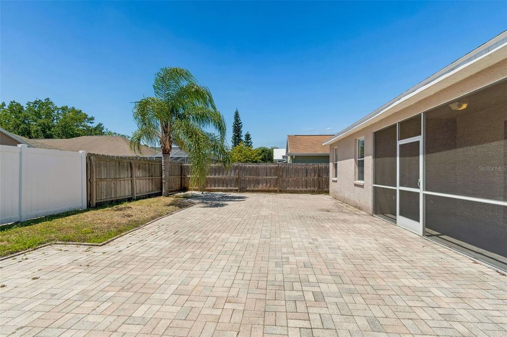 Image 85 of property listing at 4789 WHISPERING WIND AVENUE, Tampa, FL 33614