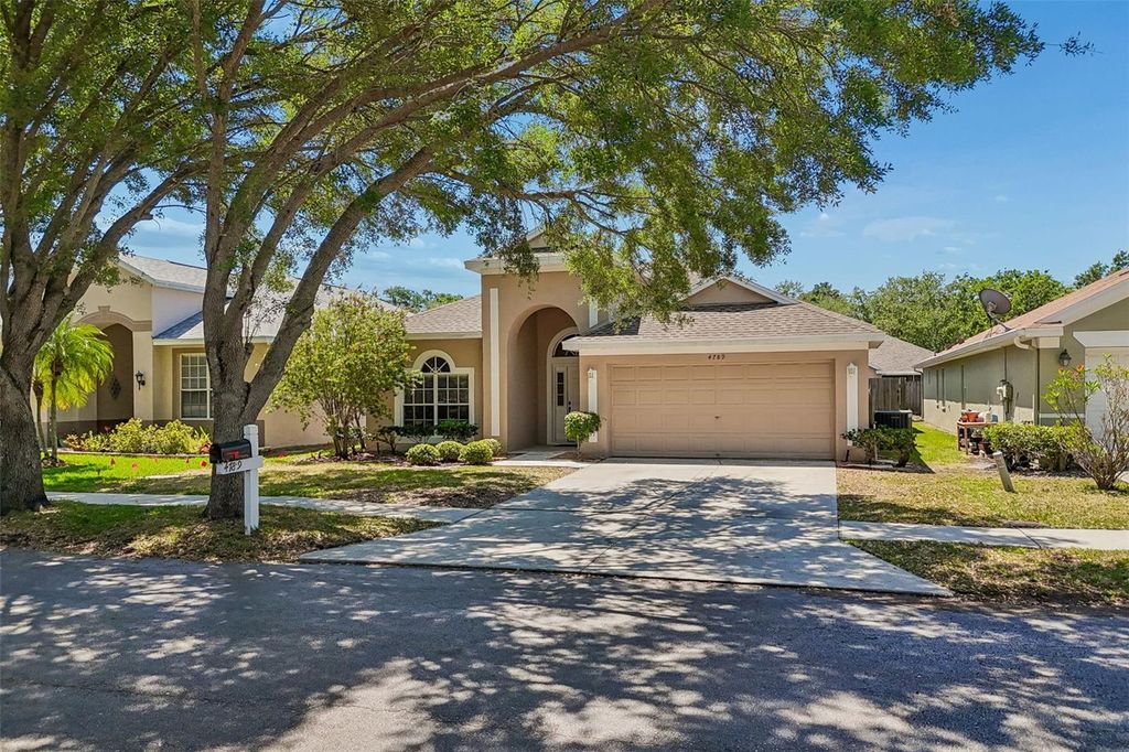 Image 88 of property listing at 4789 WHISPERING WIND AVENUE, Tampa, FL 33614