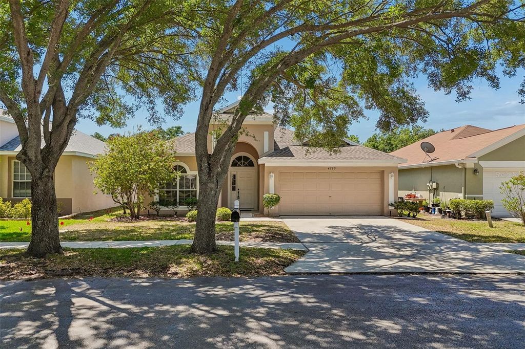 Image 89 of property listing at 4789 WHISPERING WIND AVENUE, Tampa, FL 33614