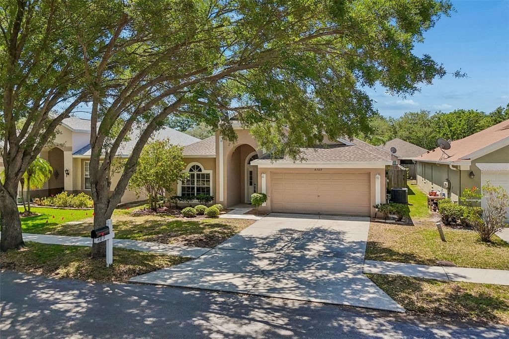 Image 90 of property listing at 4789 WHISPERING WIND AVENUE, Tampa, FL 33614