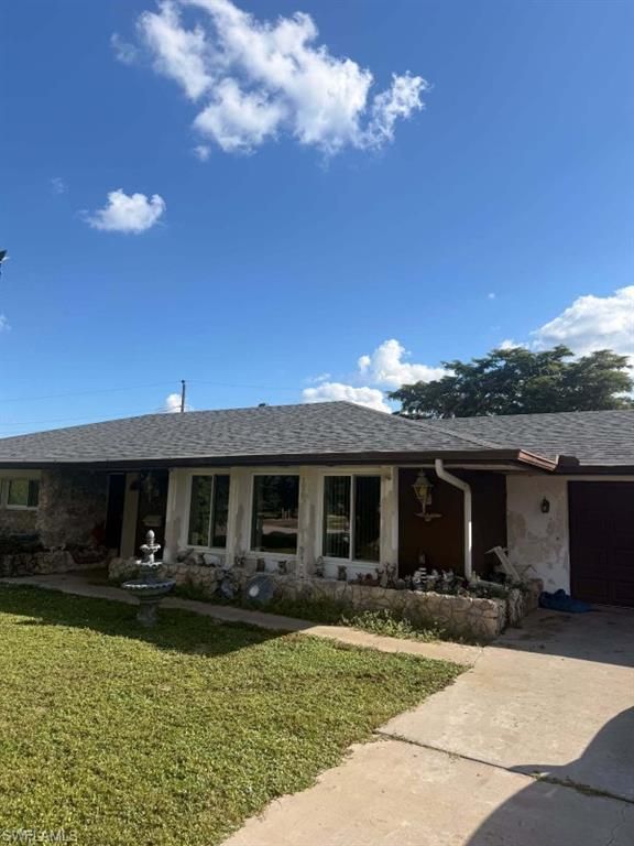 113 E Lake DR, Lehigh Acres, FL 33936