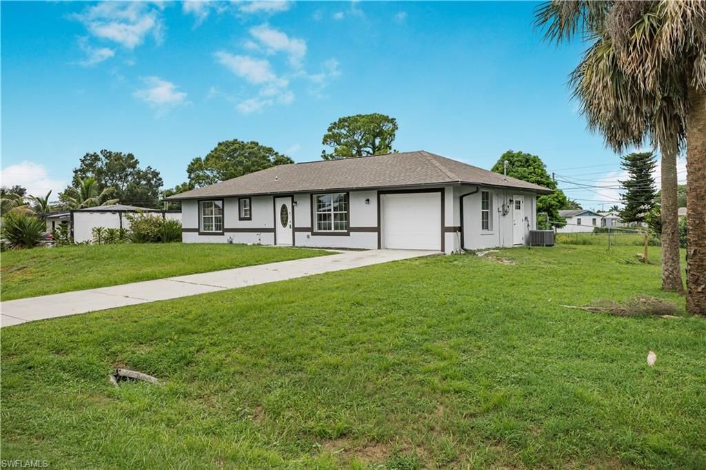803 Monroe DR, LEHIGH ACRES, FL 33936 — exterior