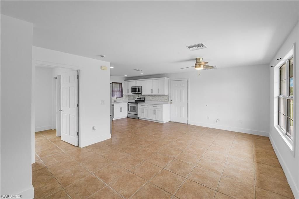 803 Monroe DR, LEHIGH ACRES, FL 33936 — photo 4