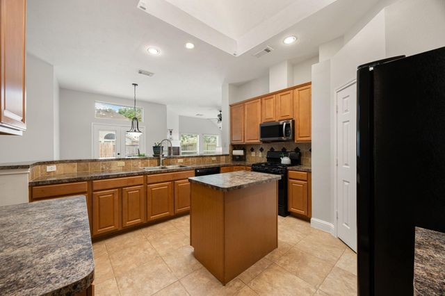 6515 Rustling Timbers Lane, Spring, TX 77379