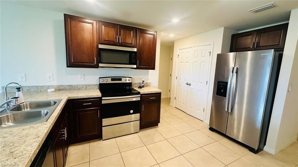 3903 16th ST SW, LEHIGH ACRES, FL 33976 — photo 4