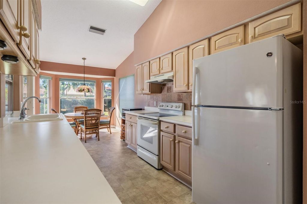 Image 6 of property listing at 1211 ALMONDWOOD DRIVE, Trinity, FL 34655
