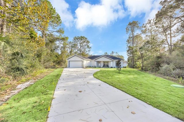 56 WHITE FEATHER LANE, Palm Coast, FL 32164