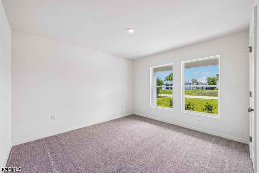 Image 13 of property listing at 711 NE 23RD TER, Cape Coral, FL 33991