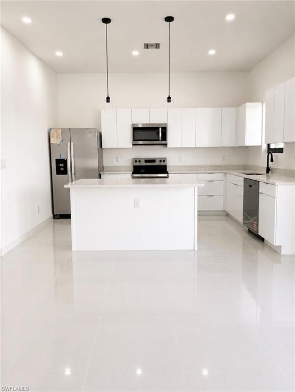Image 6 of property listing at 2918 Diplomat PKWY W, Cape Coral, FL 33993
