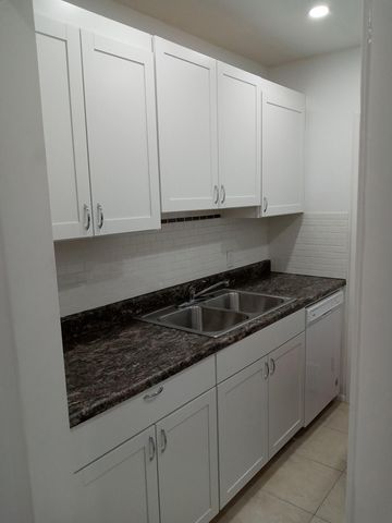 1250 E SAMPLE Road 303, Pompano Beach, FL 33064