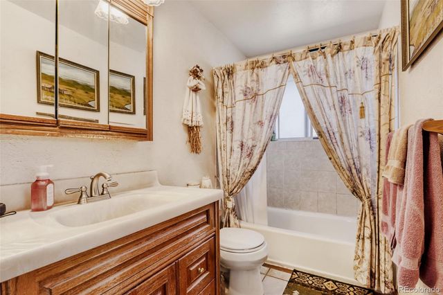 9018 W 77th Place, Arvada, CO 80005