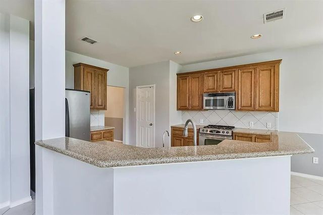 13002 Misty Bay Ln, Pearland, TX 77584