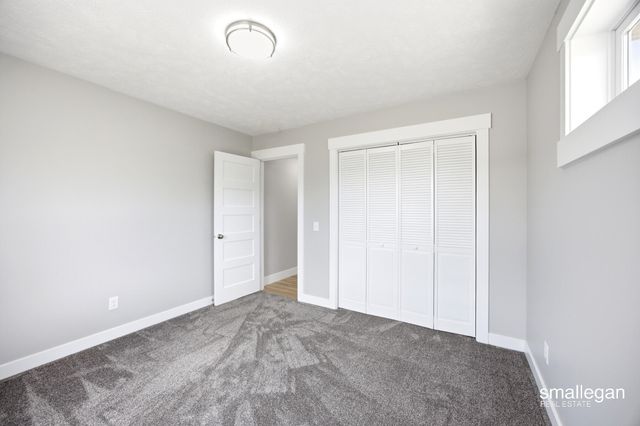 13881 Meadow Oak Drive NE, Greenville, MI 48838