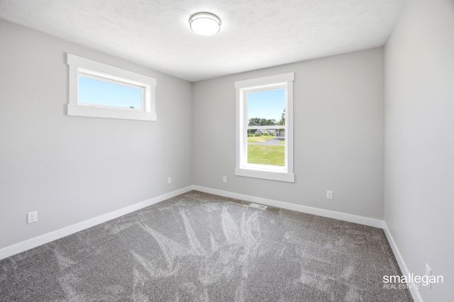 13881 Meadow Oak Drive NE, Greenville, MI 48838