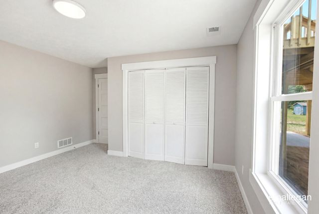 13881 Meadow Oak Drive NE, Greenville, MI 48838