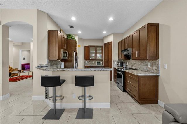 6634 JOG PALM Drive, Boynton Beach, FL 33437