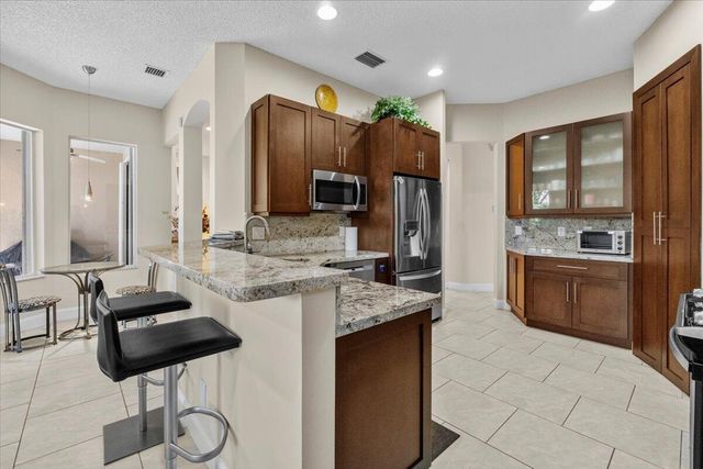 6634 JOG PALM Drive, Boynton Beach, FL 33437