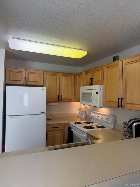 Image 5 of property listing at 6001 S Yosemite Street G204, Greenwood Village, CO 80111