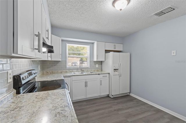 1703 BIRCHWOOD CIRCLE 1, Leesburg, FL 34748