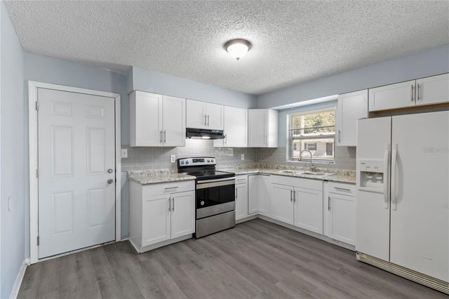 1703 BIRCHWOOD CIRCLE 1, Leesburg, FL 34748