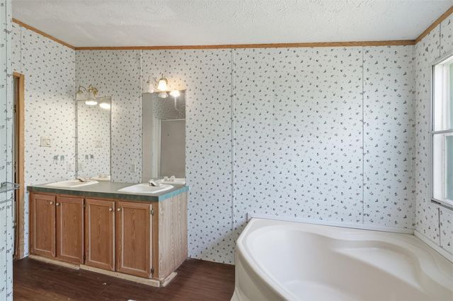 910 County Road 3556, Cleveland, TX 77327