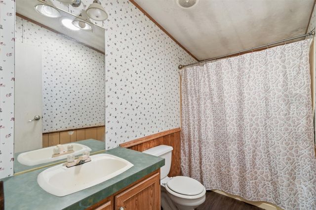 910 County Road 3556, Cleveland, TX 77327