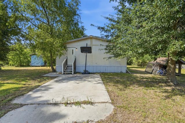 910 County Road 3556, Cleveland, TX 77327