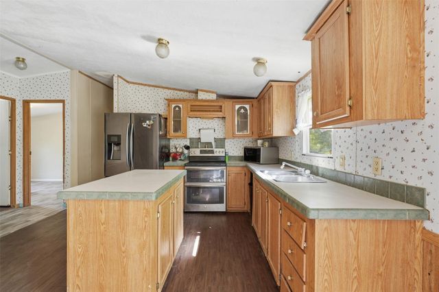 910 County Road 3556, Cleveland, TX 77327