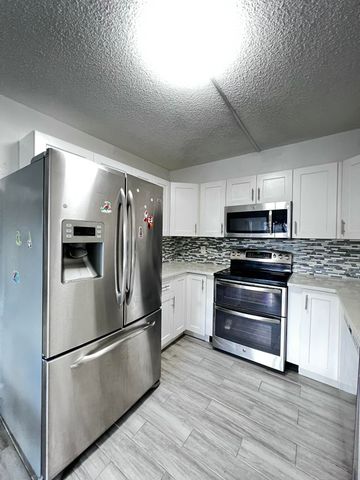 295 Woodland Road, Palm Springs, FL 33461