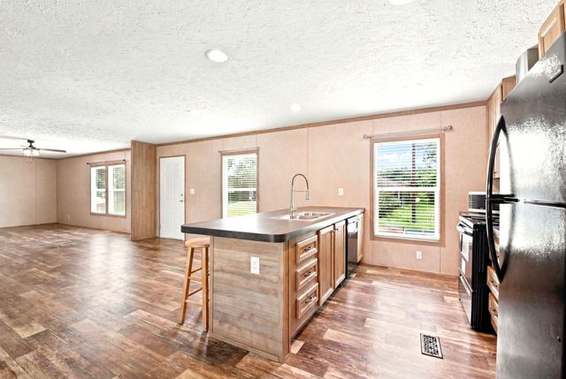 406 Baker Circle, Ames, TX 77575