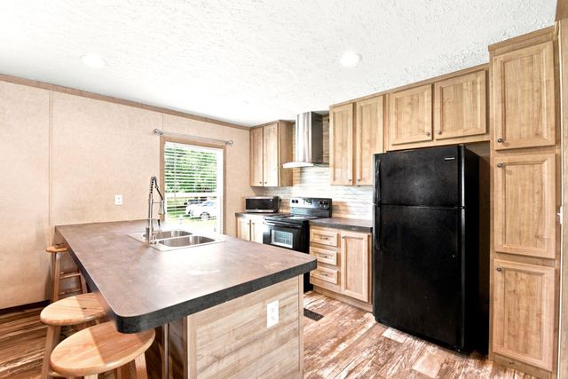 406 Baker Circle, Ames, TX 77575