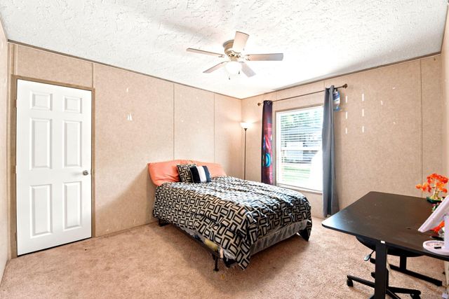 406 Baker Circle, Ames, TX 77575