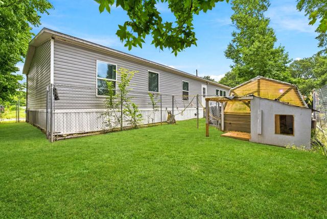 406 Baker Circle, Ames, TX 77575