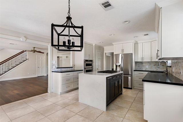 7811 Shelton Shadows Court, Humble, TX 77346