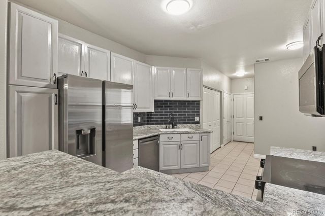 8327 S Garland Circle, Littleton, CO 80128